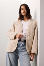 Quilted Collarless Jacket by DONNI.