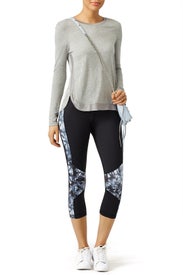 Palm Shadow Blocked Crop Leggings by ALALA