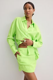 Curved Hem Mini Skirt by JW Anderson