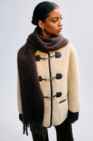 Collarless Buckled Shearling Jacket by DUNST