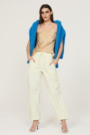 Cream Cargo Pants by DONNI.