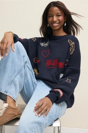 Embroidered Oversized Crewneck Sweater by The Great.