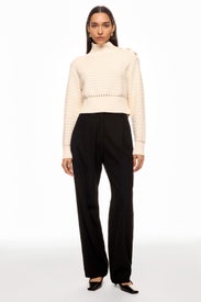 Ivory Textured Knit Mock Neck Sweater by Toccin
