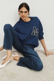 Miles Oversized Letterman Sweatshirt by Anine Bing
