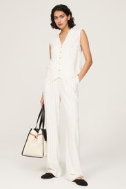 Pinstripe Pleated Pants by DONNI.