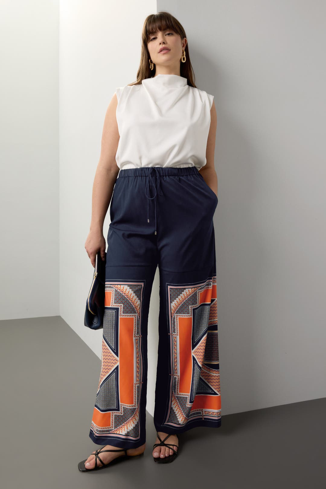 【送料&関税込】Versace Pattern-printed Wide-leg Trousers Printed wide-leg pants in blue - Versace | Mytheresa