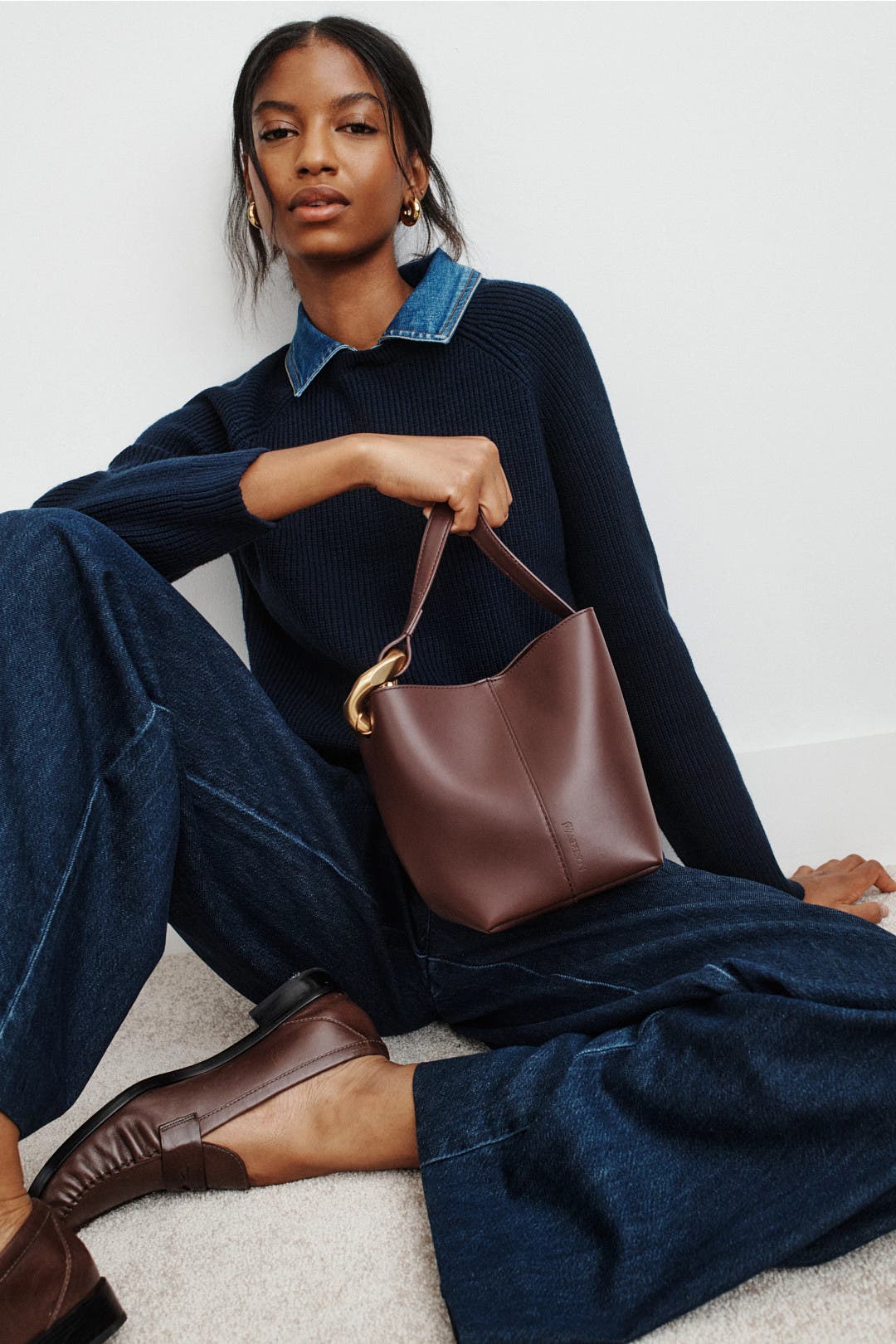 JWA Corner Small Bucket Bag by JW Anderson Accessories | Rent the