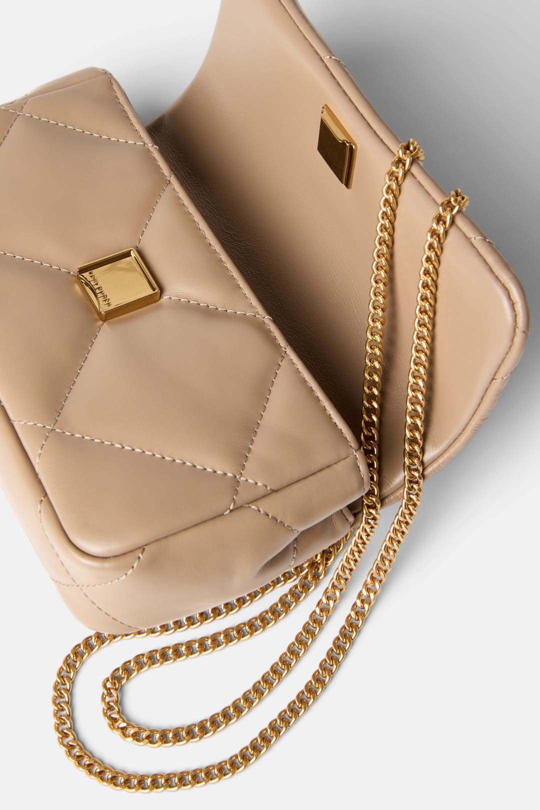 Kira Diamond Quilt Mini Flap Bag by Tory Burch Accessories | Rent